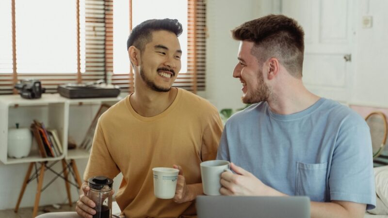 two men drinking coffee