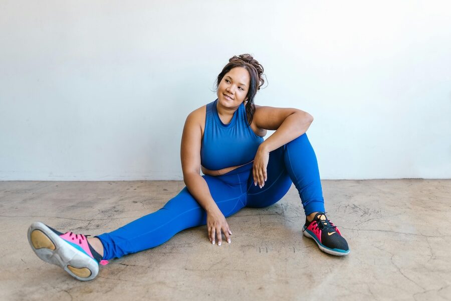 person in gym clothes trainers blue