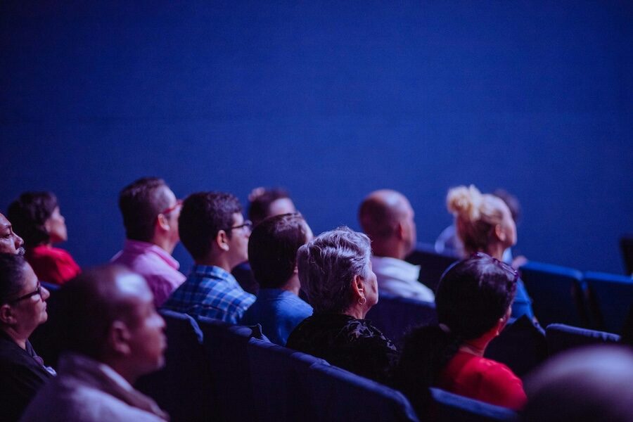 people in audience looking forward