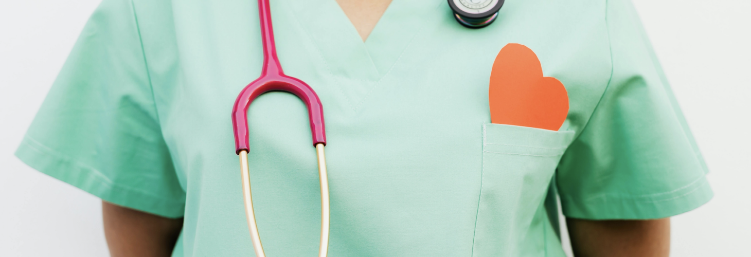 healthcare professional wearing stethoscope and heart on top