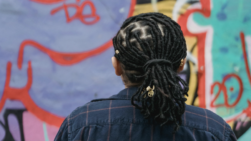 back of person's head graffiti