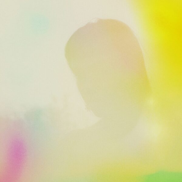 silhouette-of-a-person-against-a-colorful-abstract-background