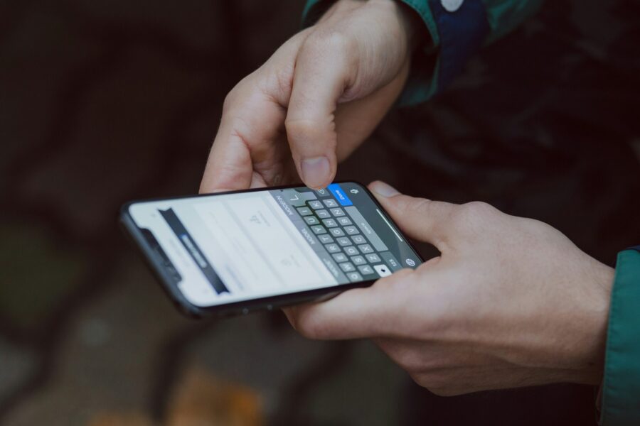 person receiving text message on phone