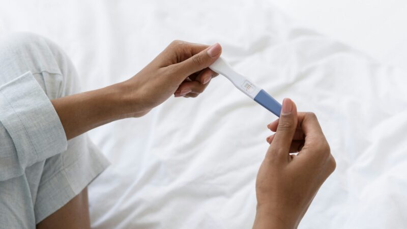 pregnancy test hand positive
