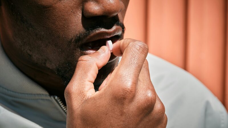 man hand taking tablet