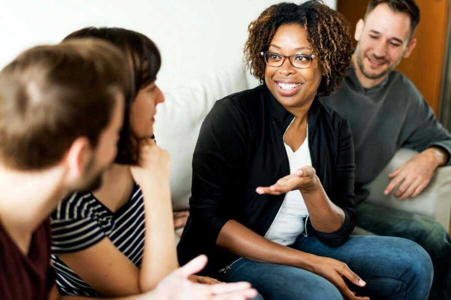 black woman white man talking smile