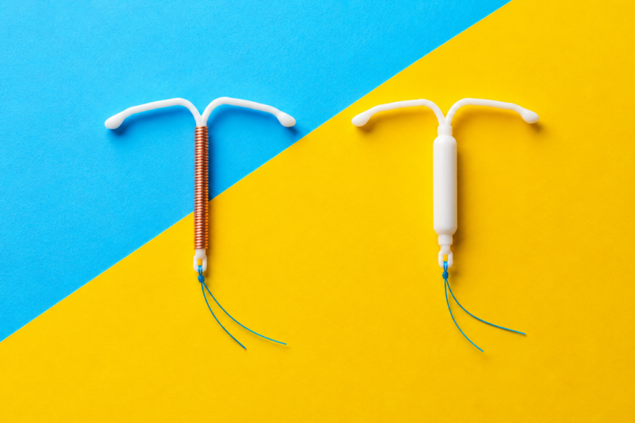 Copper coil and hormonal coil shown side by side on a blue and yellow background